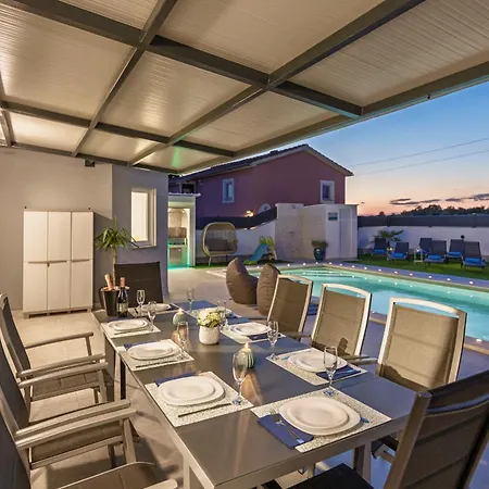 Otium For 8 People With 32 M2 Heated Pool, Outdoor Cinema, Kids Playground & Area Villa Loborika